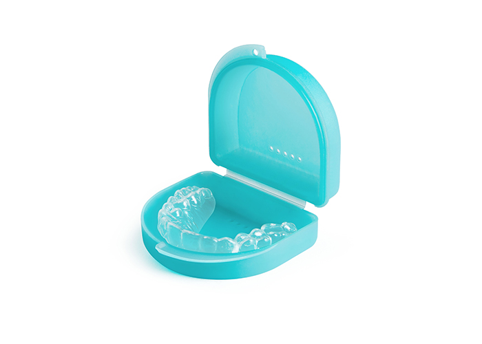 Clear aligner in blue storage case for orthodontic treatment at SS Orthodontics in Glendale and Phoenix, AZ
