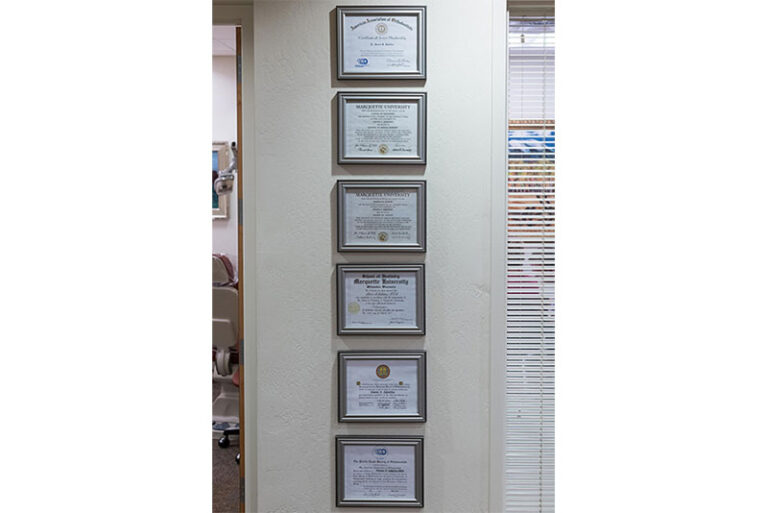 Framed dental and orthodontic certifications displayed at SS Orthodontics in Glendale, AZ